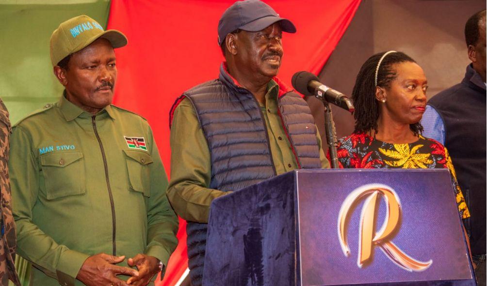 Kalonzo Musyoka(left) Raila Oding and Martha Karua(right)