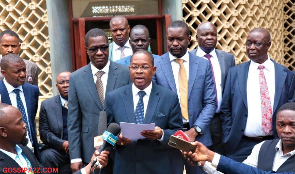 MPs led by National Assembly Minority Leader Opiyo Wandayi and his Senate counterpart Stewart Madzayo (front) address the media at Parliament Buildings on March 22, 2023. 