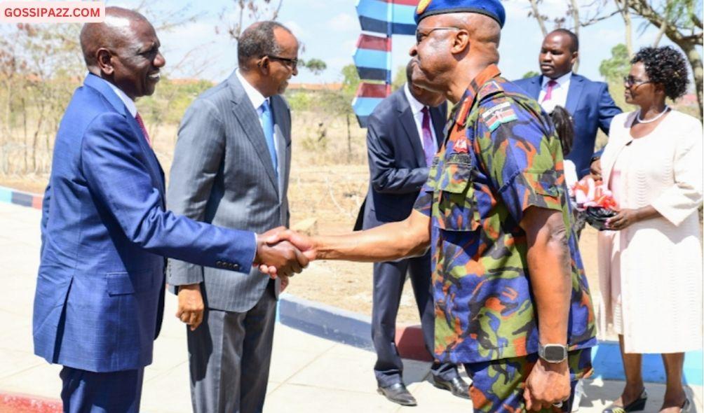 President William Ruto and General Francis Ogolla shaking hands during an event on October 14, 2022.