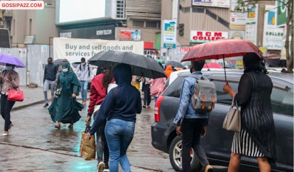 Kenyans walking in the rain in Nairobi.