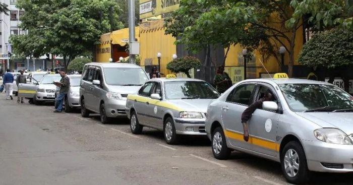 Taxi vehicles pictured while parking along Nairobi's Central Business District on July 9, 2021.