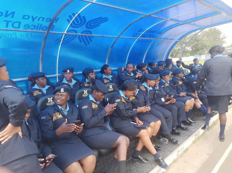 Police women officers wearing the new set of navy blue uniforms that will have the name of the officer