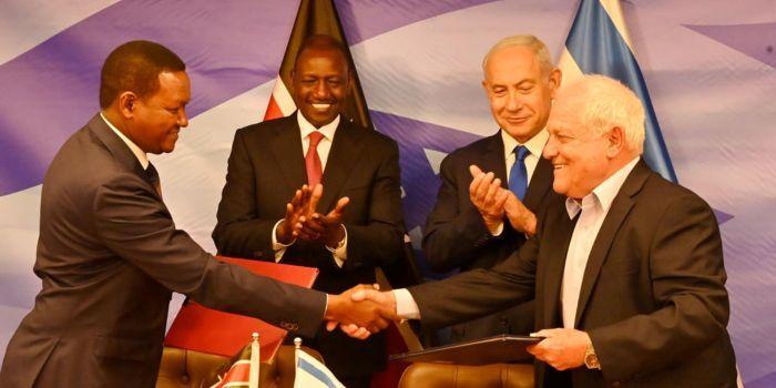 President William Ruto and Israel Prime Minister Benjamin Netanyahu look on as Foreign and Diaspora Affairs Cabinet Secretary Alfred Mutua (left) and Israel Minister of Tourism Haim Katz (right) shake hands in Jerusalem, Israel, on May 9, 2023.