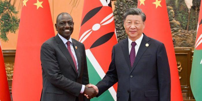 President William Ruto shakes hands with his Chinese counterpart Xi Jinping on October 18, 2023