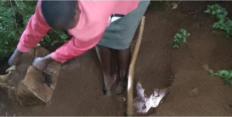 The suspect exhumes the body of her day-old infant in Rachuonyo South, Homa Bay County, on January 13, 2024.