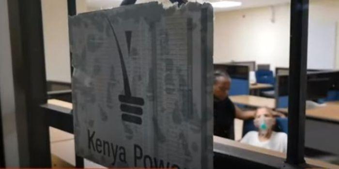 Patient and her sister-in-law at Kenya Power and Lighting Company Offices where she had been brought follwing a prolonged power black-out at home.