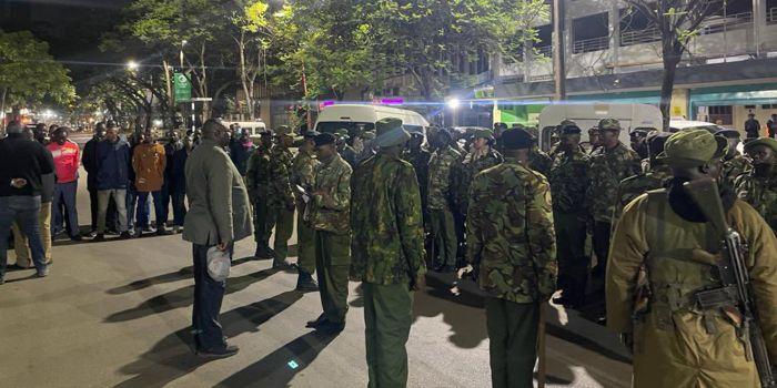 A photo of police officers conducting a raid on nightclubs at City Hall in Nairobi in November 2022.