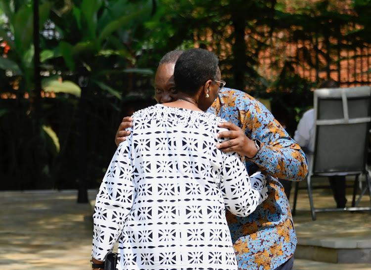 Uhuru Kenyatta hugging Janet Museveni