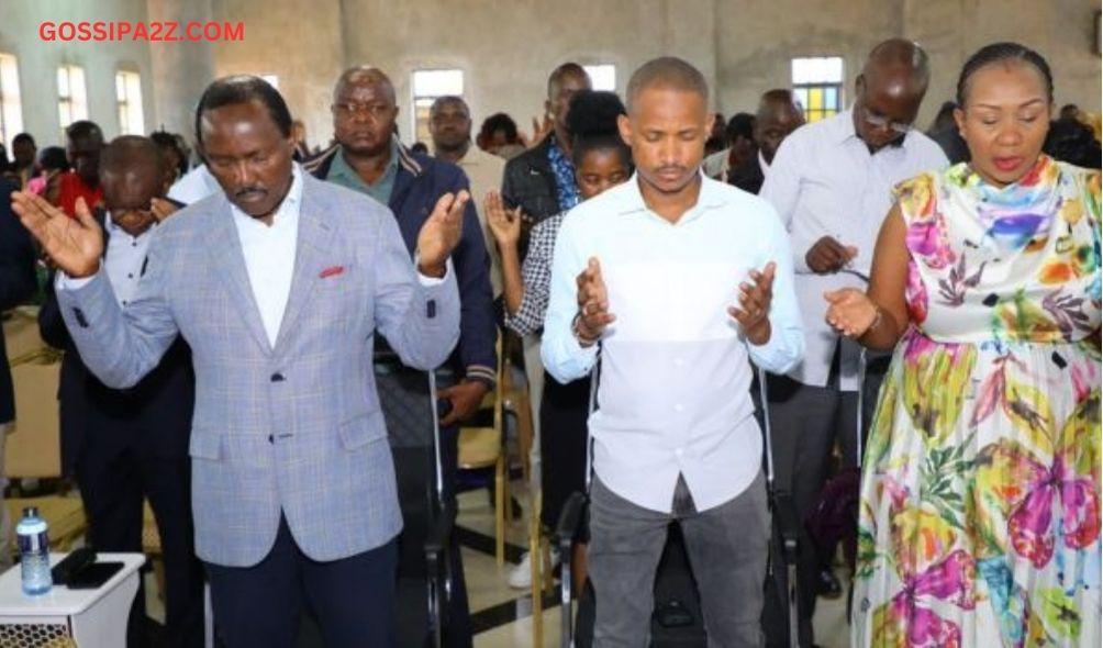 Wiper Leader Kalonzo Musyoka (left) and Embakasi East MP Babu Owino praying during a church service in Kiambu County in March 17, 2023.