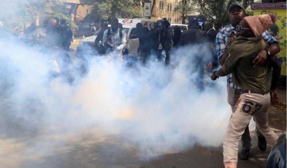 Police throw tear gas at hundreds of people protesting near parliament on Tuesday, June 6, 2023.