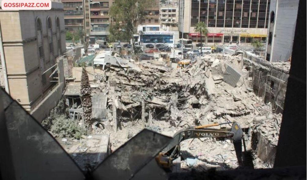 An excavator clears rubble after a suspected Israeli strike on Monday on Iran's consulate, adjacent to the main Iranian embassy building, which Iran said had killed seven military personnel including two key figures in the Quds Force, in the Syrian capital Damascus, Syria April 2, 2024. REUTERS/Firas Makdesi/File Photo