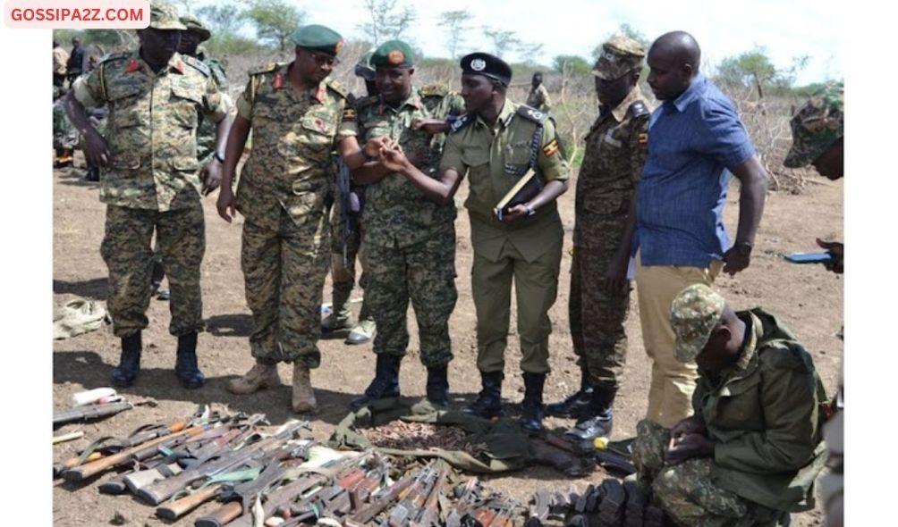 Some UPDF soldiers and police display firearms recovered from the Turkana pastoralists during August 8, 2023.