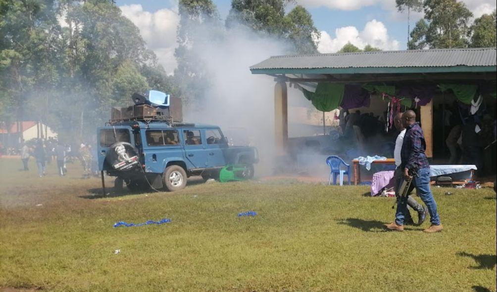 Plumes of smoke are seen after police lobbed teargas canisters during a PAG church service in Kisii on Sunday, May 5,2023.