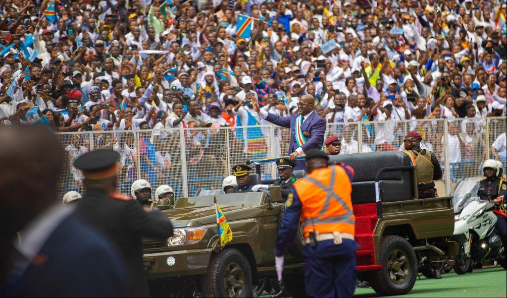 DRC President Felix Tshisekedi (C) greets supporters as he arrives for his swearing-in ceremony at the Stade des Martyrs in Kinshasa, on January 20, 2024.