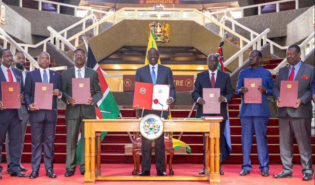  Wiper leader Kalonzo Musyoka, former Mombasa Governor Hassan Joho, Senate Speaker Amason Kingi, National Assembly Speaker Moses Wetang'ula, President William Ruto, Deputy President Rigathi Gachagua, Azimio leader Raila Odinga and Prime Cabinet Secretary Musalia Mudavadi during the signing of the IEBC (Amendment) Bill, 2024 at KICC on July 9, 2024.