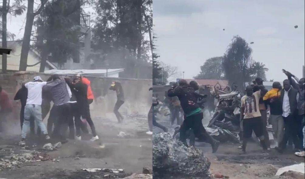 Nairobi Governor Johnson Sakaja's security team forms a protective around him as he was pelted with stones at Toi market on August 3, 2024.