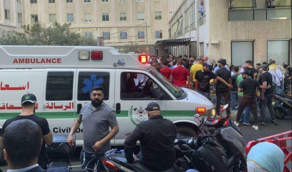 People gather outside a hospital, as hundreds of members of the Lebanese armed group Hezbollah, including fighters and medics, were seriously wounded on Tuesday when the pagers they use to communicate exploded, according to a security source, in Beirut, Lebanon September 17, 2024. REUTERS/Mohamed Azakir