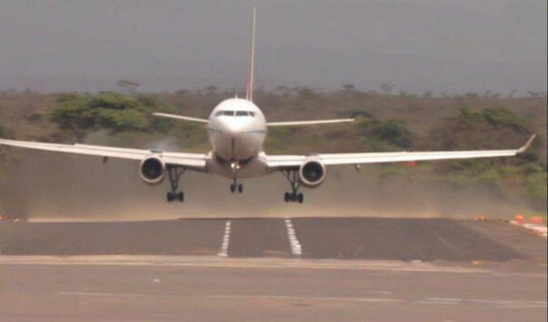 A Plane landing at an airport in Kenya.