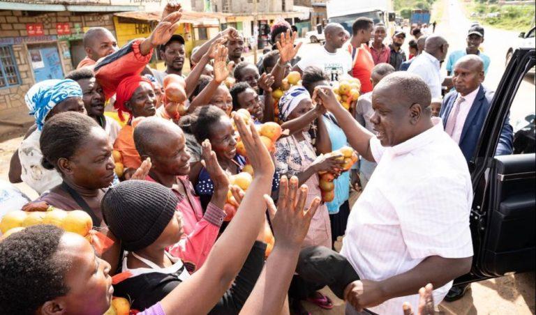 File image of Fred Matiang'i interacting with Kitui residents