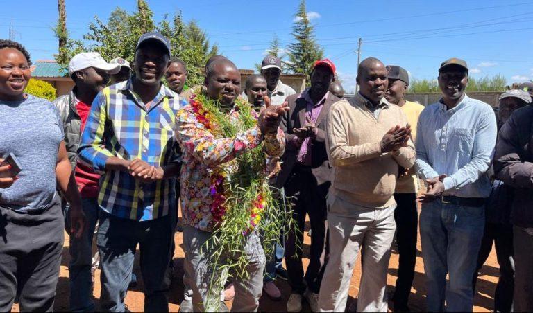 MCA David Leting alias Kokwas celebrates with residents of his Kipkenyo ward in Eldoret