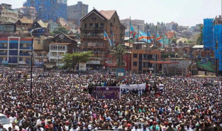 People attend a rally addressed by Corneille Nangaa, Congolese rebel leader and coordinator of the AFC-M23 movement, in Bukavu, eastern Democratic Republic of Congo February 27, 2025. REUTERS/Victoire Mukenge