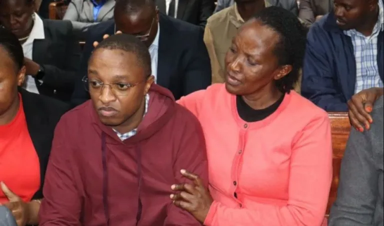 Blogger Ndiangui Kinyagia (in maroon hooded sweatshirt) appears before the court in Nairobi on July 3, 2025